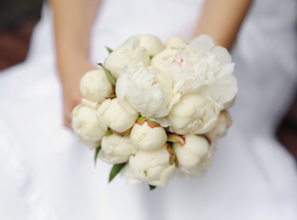 Wedding flowers trend: Handtied bouquet with peonies